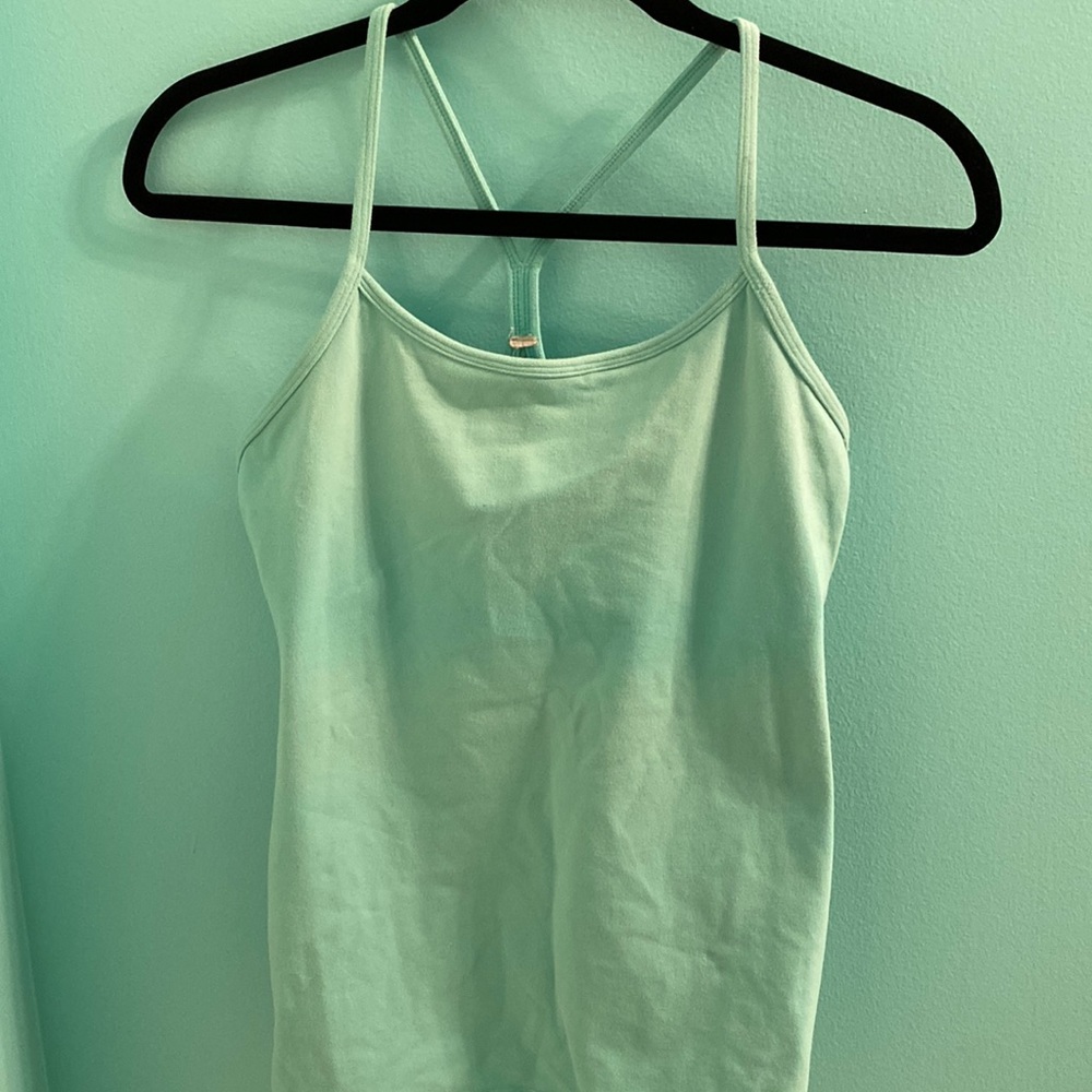Lululemon Flow Y tank built in bra. Good used condition with some wear to fabric